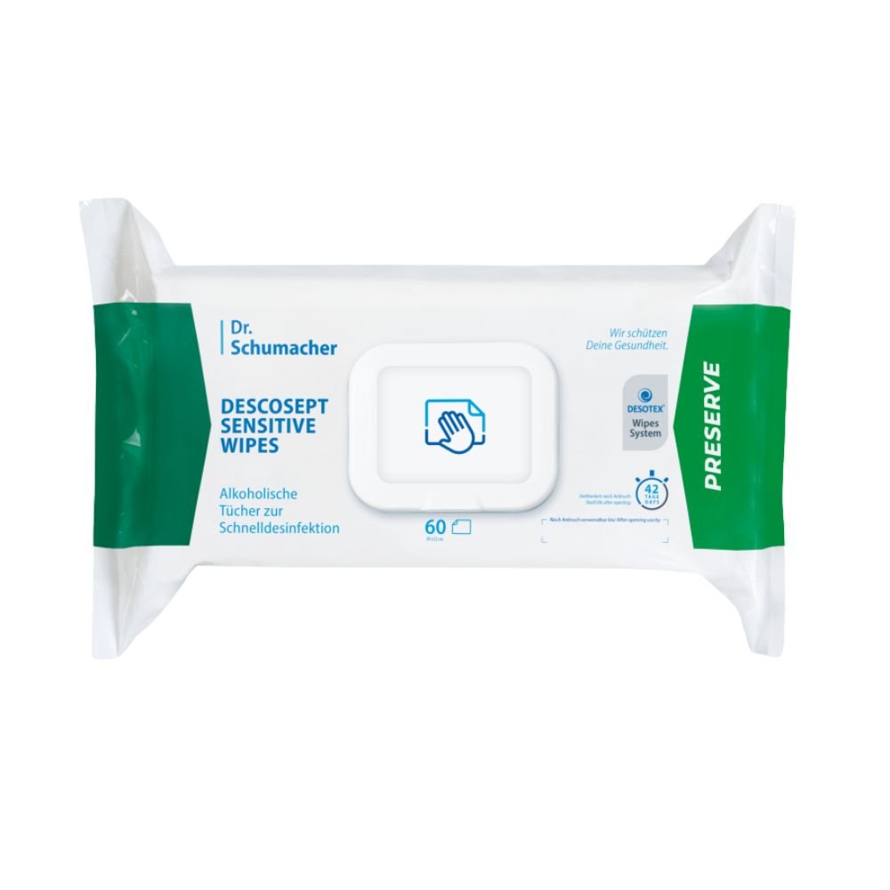 Een verpakking Dr. Schumacher Descosept Sensitive Wipes-desinfectiedoekjes van Dr. Schumacher GmbH voor snelle desinfectie. Op het etiket staat vermeld dat het om doekjes op alcoholbasis gaat, die bij uitstek geschikt zijn voor middelgrote oppervlakken. De verpakking is overwegend wit met groene accenten en bevat 60 doekjes.