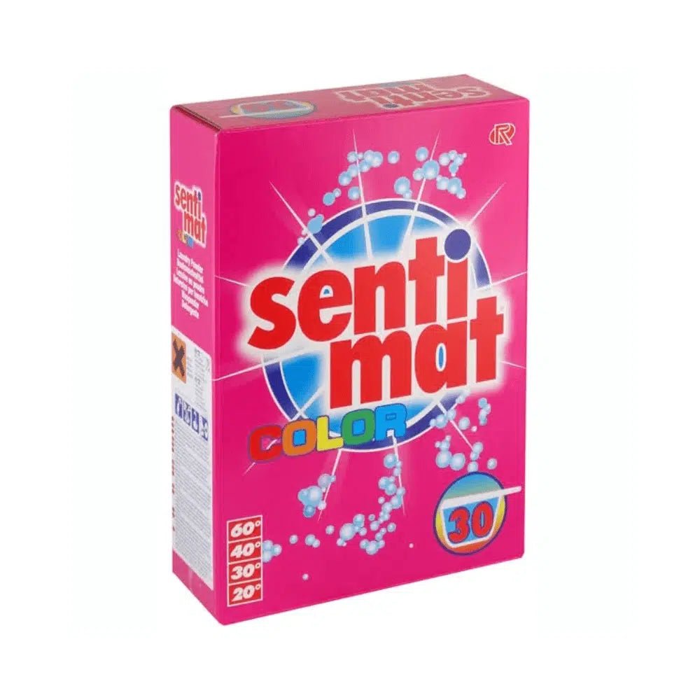 Een roze doosje Rösch Sentimat Color wasmiddel voor gekleurde was van Rösch Germany GmbH heeft een blauw-wit ontwerp dat is versierd met afbeeldingen van moleculen. Het benadrukt de vlekverwijderende eigenschappen en is geschikt voor wasbeurten op 60, 40, 30 en 20 graden, waarbij het getal 30 duidelijk zichtbaar in een cirkel is weergegeven.