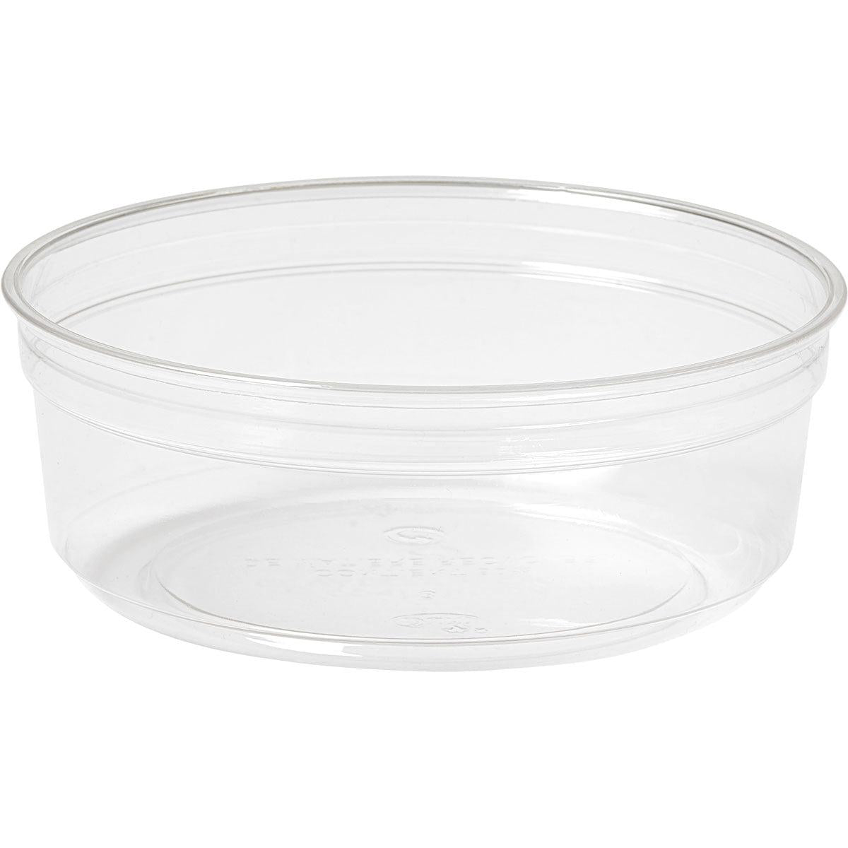 De Deli-schaal Crystal, transparant van Duni GmbH is een heldere, ronde serveerschaal zonder deksel, die leeg tegen een witte achtergrond is afgebeeld. Het transparante ontwerp onthult geprinte markeringen op de bodem.