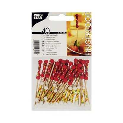 Een verpakking met 40 PAPSTAR Fingerfood pickers "Mexico", elk 7,5 cm met rode en witte parels, ideaal voor feestjes. Gepresenteerd door de PAPSTAR GmbH in een zak met doorzichtvenster voor een aantrekkelijke presentatie.