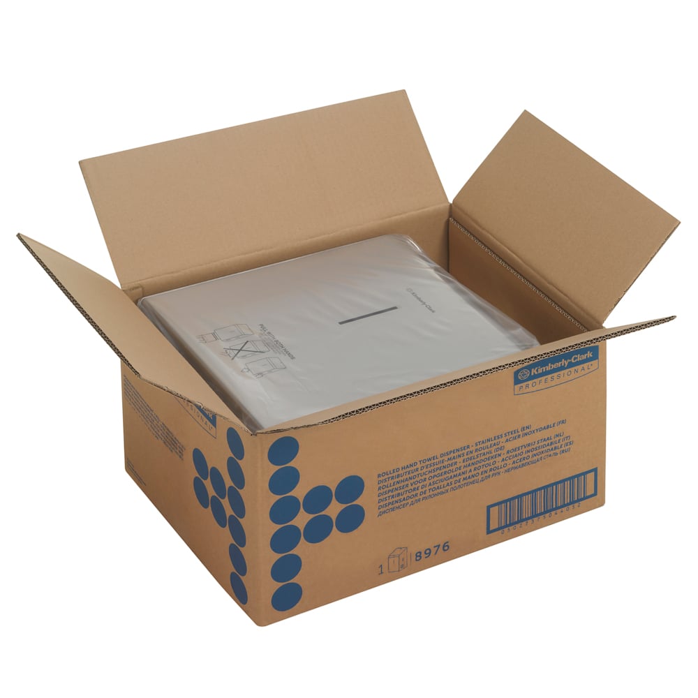 Een open doos met blauwe Kimberly-Clark Professional™ grafiek bevat een Kimberly-Clark GmbH rollenhanddoekdispenser (roestvrij staal, 1 dispenser), geschikt voor gebruik met handdoekdispenser of rollenhanddoekdispenser roestvrij staal.