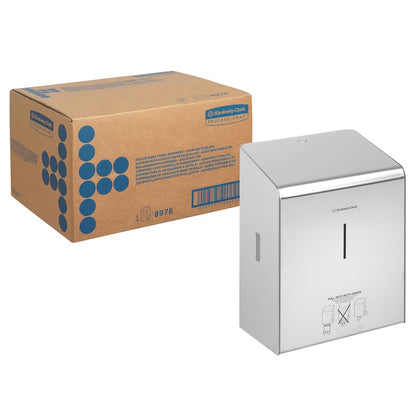 Een doos van Kimberly-Clark GmbH staat naast een Kimberly-Clark Professional™ rollenhanddoekdispenser roestvrij staal, met een gleuf aan de voorkant en een gemakkelijk te begrijpen handleiding eronder.