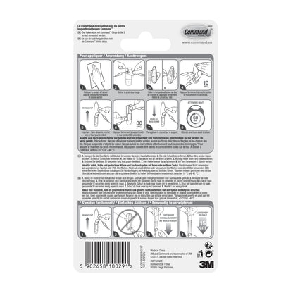 Auf der Rückseite der Command™ Metallhaken "klassisch"-Verpackung der 3M Deutschland GmbH befinden sich eine bebilderte Schritt-für-Schritt-Anleitung zur Anwendung und Entfernung, mehrsprachige Tipps und Sicherheitshinweise sowie ein Barcode und Logos am unteren Rand.