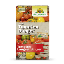 Een rechthoekige doos Azet TomatenMeststof van Neudorff Shop met tomatenafbeeldingen, branding en Duitse tekst benadrukt de organische formule voor langdurige bemesting en rijke tomatenoogst.
