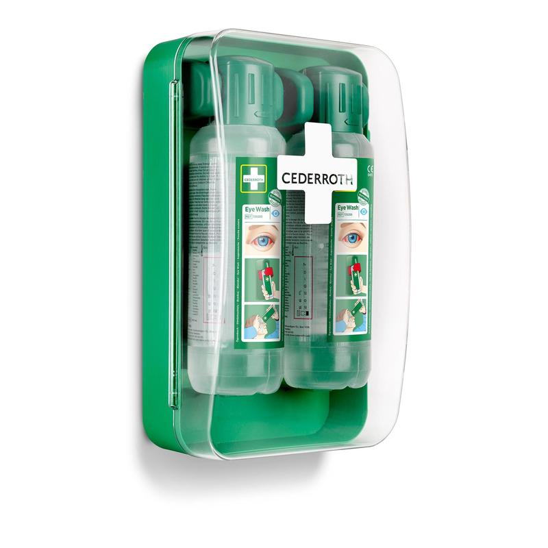 De Cederroth oogspoelkast 1x1 van Orkla Wound Care AB bevat twee doorzichtige oogspoelflessen met groene doppen en een geïllustreerde gebruiksaanwijzing, die beschermd worden door een doorzichtige beschermhoes - een onmisbare nood-oogspoelset.