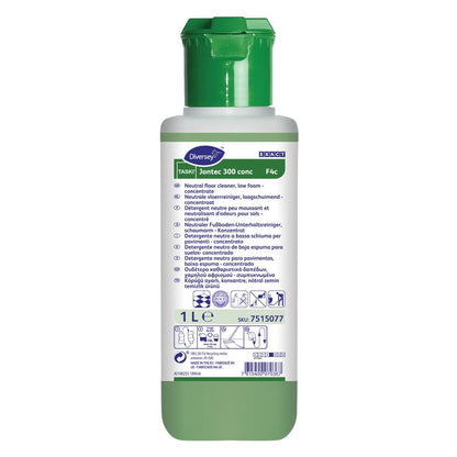Eine 1-Liter-Flasche TASKI Jontec 300 conc Bodenreiniger Hochkonzentrat von Diversey Deutschland GmbH & Co. OHG verfügt über einen grünen Verschluss, ein weißes Etikett mit mehrsprachigen Anweisungen und sorgt für strahlenden Glanz auf Böden.