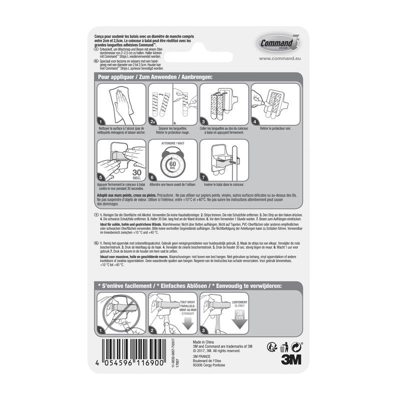 De achterkant van een Command™ bezemhouder, 17007-FR-verpakking van 3M Deutschland GmbH toont een geïllustreerde, meertalige handleiding voor het aanbrengen en verwijderen van de houder met Command kleefstrips. Diagrammen begeleiden stap voor stap door de montage en demontage.
