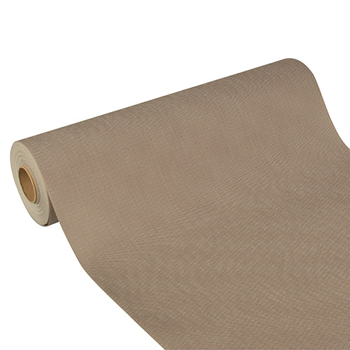De Starpak tafelloper „Soft Selection Plus“ van stofachtig vlies (24 m x 40 cm) in beige is gedeeltelijk uitgerold op een witte ondergrond – perfect voor feestelijke gelegenheden.