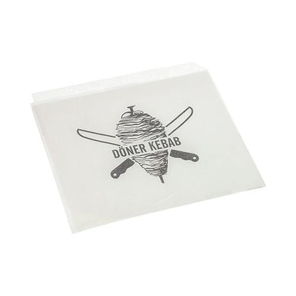 De PAPSTAR döner-kebab-zakken, perkamentvervanger, 16x16 cm, vetdichte krimpfolie (1000 stuks) van PAPSTAR GmbH is een duurzame, witte voedselverpakking met een döner spies en gekruiste messen evenals de tekst "DÖNER KEBAB".
