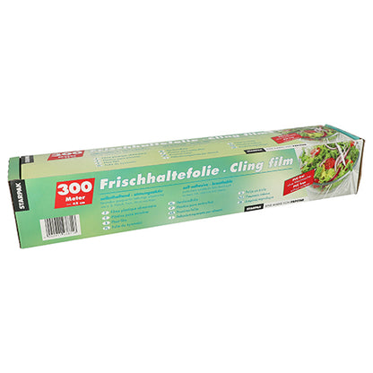 De Starpak vershoudfolie vouwdoos is een rechthoekige doos van vershoudfolie (300 meter) met groene verpakking en de opschriften "Vershoudfolie" en "Cling Film", die saladebeelden en instructies bevat voor het vers houden van uw voedsel.