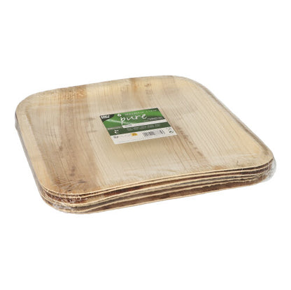 Een stapel vierkante PAPSTAR 6 borden, palmblad "pure" vierkant van de PAPSTAR GmbH, verpakt in een doorzichtige kunststofverpakking met een groen-wit etiket bovenop.