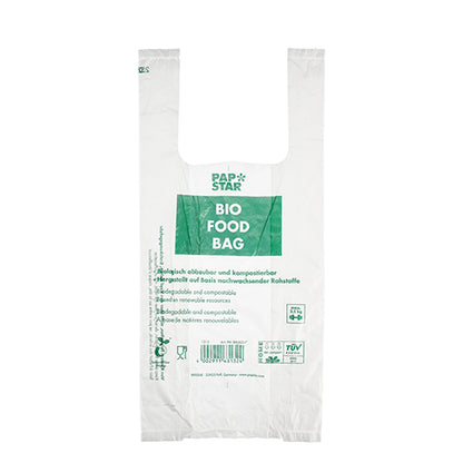 Een transparant bio-folie zakje met de opdruk "BIO FOOD BAG" in groene tekst van de PAPSTAR GmbH. Deze milieuvriendelijke hemdtas is biologisch afbreekbaar, composteerbaar en komt als een rol van 100 knooptasjes.