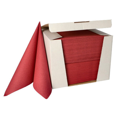 Een stapel PAPSTAR 100 servetten "ROYAL Collection" 1/4-vouw 40 cm x 40 cm van de PAPSTAR GmbH wordt gedeeltelijk uit een open witte dispenserdoos getrokken.