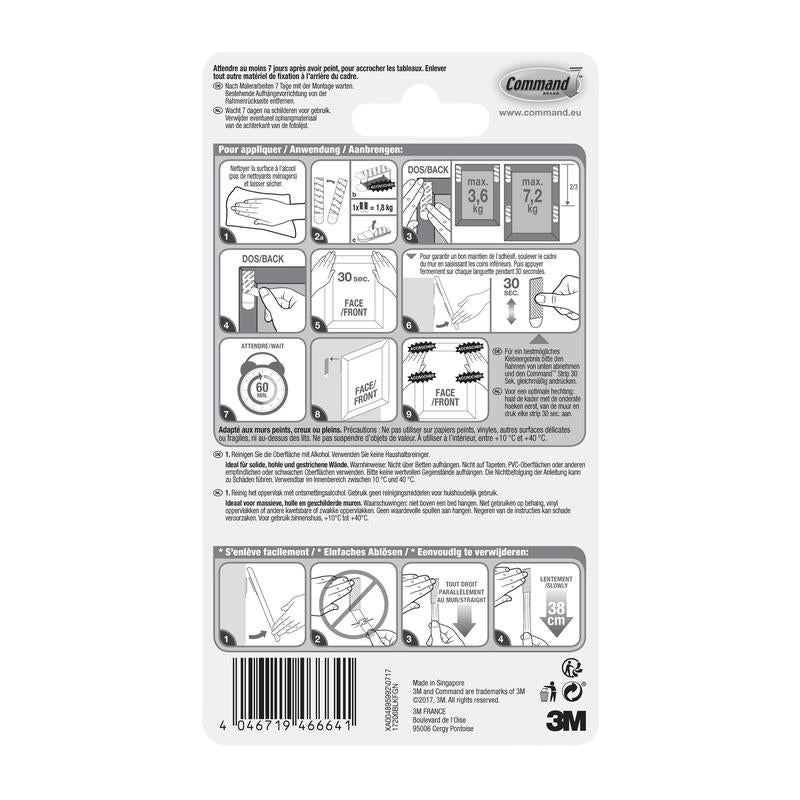 De achterkant van de 3M Deutschland GmbH Grote zwarte Command™ Bevestigingsstrips 17206BLK verpakking toont geïllustreerde stapsgewijze instructies, gewichtsgrenzen en veiligheidswaarschuwingen voor schadevrij ophangen, met tekst in meerdere talen.