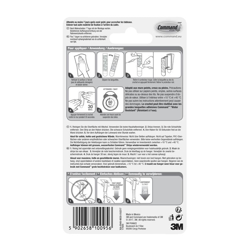 De achterkant van een Command™ canvasophanger-verpakking van 3M Deutschland GmbH bevat een geïllustreerde toepassings-/verwijderingsinstructie in vier talen, een barcode aan de onderkant, fabrikantgegevens en het 3M-logo.