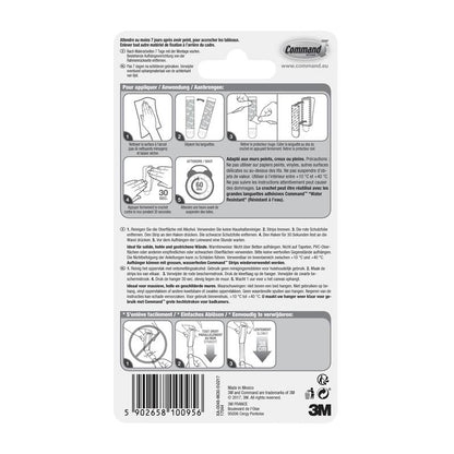 De achterkant van een Command™ canvasophanger-verpakking van 3M Deutschland GmbH bevat een geïllustreerde toepassings-/verwijderingsinstructie in vier talen, een barcode aan de onderkant, fabrikantgegevens en het 3M-logo.