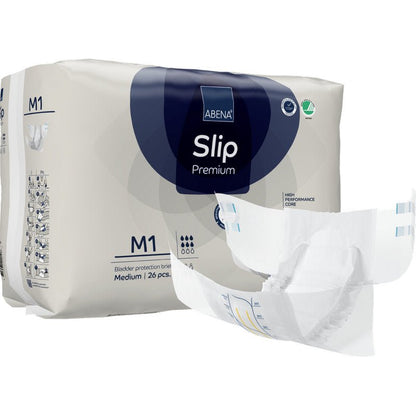Afgebeeld is een verpakking met de opdruk "ABENA Slip Premium" van Abena Re-Seller GmbH met een opengevouwen luier op de voorgrond. De verpakking bevat 26 middelgrote stuks voor betrouwbare incontinentiezorg.