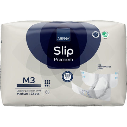 Een verpakking ABENA Slip Premium van Abena Re-Seller GmbH, middelgrote maat, 23 slips. Met krachtige kern en huidvriendelijk ontwerp. De verpakking toont een ongevouwen slip - ideaal voor betrouwbare incontinentiezorg.