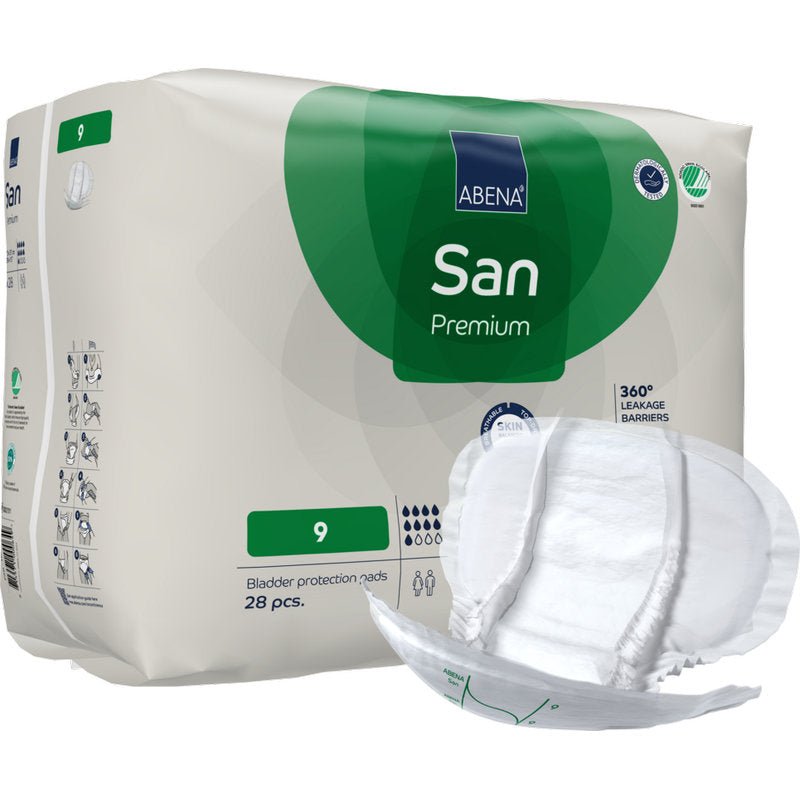 Een beige verpakking met groene en witte accenten toont "ABENA San Premium" van Abena Re-Seller GmbH. Op de voorkant staat "9", hoge absorptie, 28 stuks binnenin, en voorop is een pad afgebeeld.