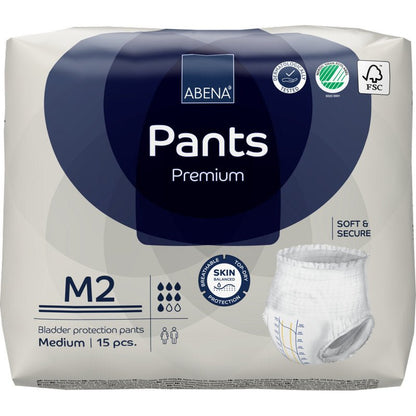 Een 15-delige verpakking ABENA Pants Premium M van Abena Re-Seller GmbH. De wit-blauwe verpakking toont iconen voor hoge absorptie, huidbescherming, absorptie en eco-certificering.