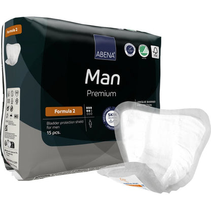 Afgebeeld is een verpakking ABENA Man Formula Premium van Abena Re-Seller GmbH met een bord op de voorgrond. De verpakking bevat 15 stuks en benadrukt de huidvriendelijke en barrièrebeschermende eigenschappen.