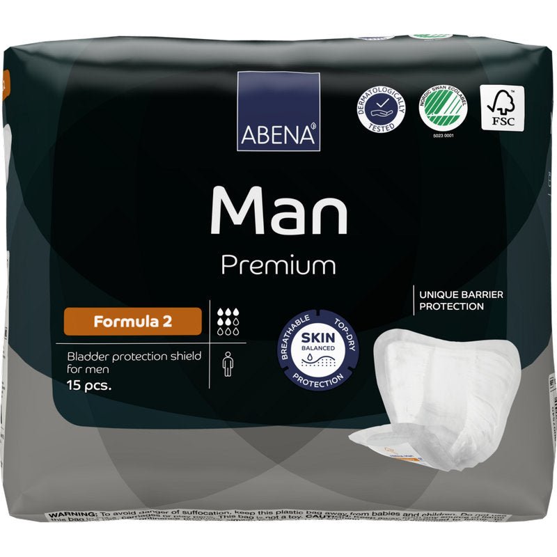 Een verpakking met 15 ABENA Man Formula Premium blaasondersteuningsschilden van Abena Re-Seller GmbH is voorzien van productinformatie, certificeringslogo's en een afbeelding van het schild op de verpakking.