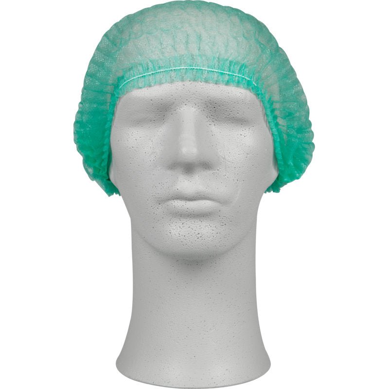 Een witte etalagekop draagt een groene clipkap, PP van Abena Re-Seller GmbH. Deze wegwerp-buffelkappen bieden een hygiënische bescherming en bedekken het hoofd volledig - ideaal voor gebruik in medische instellingen.
