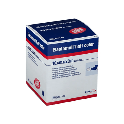 Uitgesteld is een BSN Elastomull® haft kleurendoos van BSN Medical GmbH, die hoofdzakelijk in blauw en wit met rode accenten is gehouden. De afmetingen '10 cm x 20 m uitgerekt' zijn duidelijk te herkennen. Dit latexvrije polymeerproduct wordt beschreven als een cohesief, elastisch fixatieverband.
