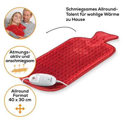 Afgebeeld is een Beurer HK 44 verwarmingskussen van Beurer GmbH met gestructureerd oppervlak en elektrische besturing. Een paar ontspant samen en houdt het verwarmingskussen in hun handen. De tekst in het Nederlands benadrukt de eigenschappen: ademend materiaal, goede pasvorm, 3 temperatuurinstellingen en allround formaat van 40x30 cm.