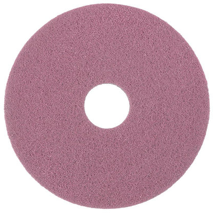 Das Diversey Twister Pad Pink für Vinylböden von Diversey Deutschland GmbH & Co. OHG ist ein rundes, rosafarbenes Reinigungspad mit rauer Oberfläche und zentralem Loch, abgebildet auf weißem Hintergrund - ideal für die Reinigung von Vinylböden.