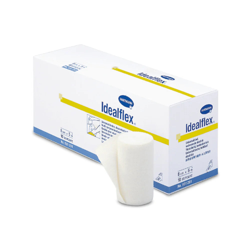Een doos Hartmann Idealflex® lichte universele zwachtel - 10 zwachtels met lichte compressiewerking, op een witte achtergrond. De doos is geopend, een opgerolde witte zwachtel is erin zichtbaar.