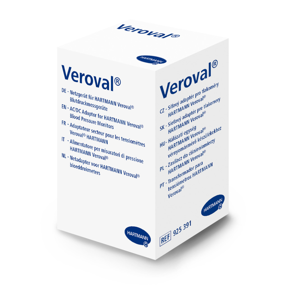 De witte "Veroval"-doos bevat een Hartmann Veroval AC/DC-adapter P1 voor bloeddrukmeters, een meertalige handleiding en het logo van de Paul Hartmann AG om de echtheid van de Veroval bovenarm-bloeddrukmeter te garanderen.