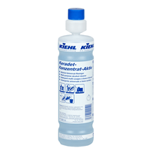 Een fles van 1 liter Johannes Kiehl KG Kiehl Keradet-concentraat-actief alcoholhoudend universele reiniger voor streeploze reiniging, met een blauwe dop en een meertalig etiket met productinformatie en gebruiksaanwijzingen.