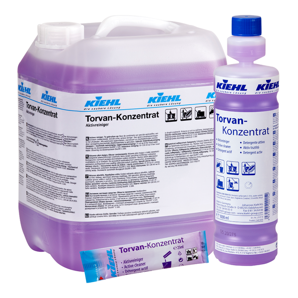 Ein Set von Johannes Kiehl KG Kiehl Torvan-Konzentrat Aktivreiniger besteht aus einem 5-Liter-Behälter, einer 1-Liter-Flasche und einem Beutel mit violetter Flüssigkeit und einer weißen Verpackung mit deutschem Etikett.