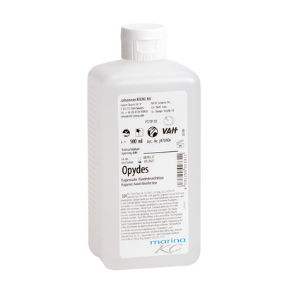 Witte 500-ml kunststof fles Kiehl Opydes Hygiënische Handdesinfectie van Johannes Kiehl KG met witte dop en etiket met gebruiksaanwijzingen, doseringsinformatie, fabrikantinformatie en certificeringslogo's.