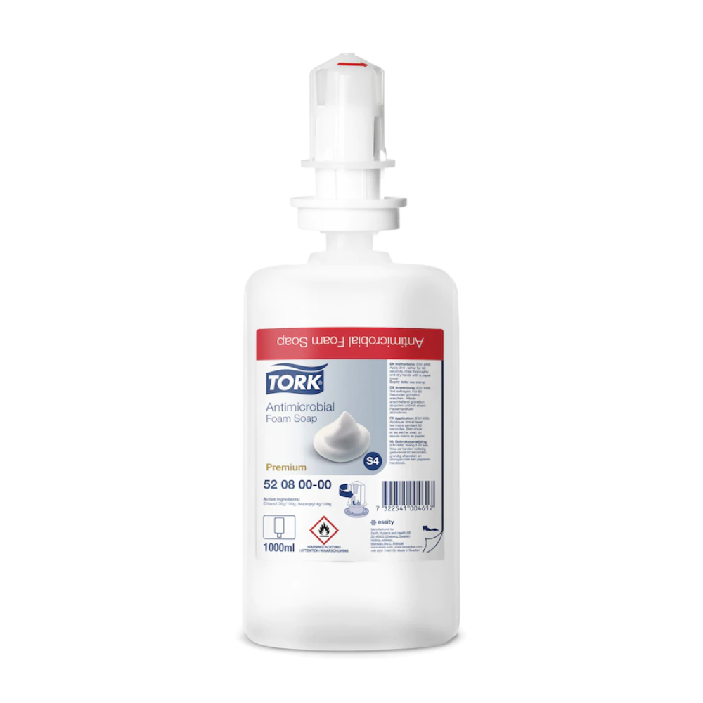 Een 1000 ml Tork 520800 schuimzeep voor handdesinfectie Premium S4 fles van TORK - Essity Professional Hygiene Germany GmbH, met witte doseerkop en rood etiket. EN 1499 gecertificeerd, ideaal voor effectieve handdesinfectie.