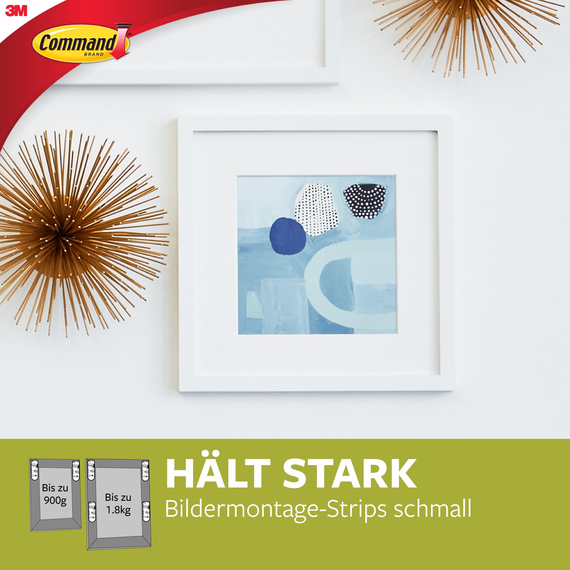 Ein abstraktes Kunstwerk in einem weißen Rahmen hängt an einer weißen Wand zwischen zwei goldenen Starbursts. Deutsche Texte bewerben die kleinen weißen Command™ Bilder-Montage Strips S 17202 von 3M Deutschland GmbH für bis zu 900g und 1,8kg (1 Stück Packung).