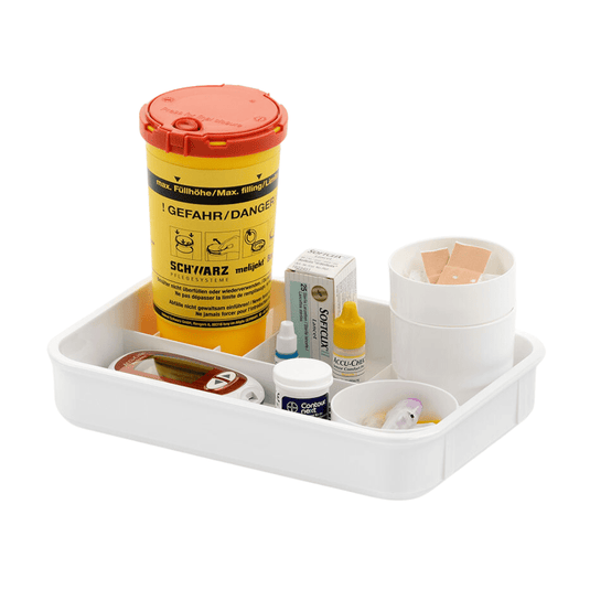 De melijekt-bloedsuikertablet E van Helmut Schwarz GmbH bestaat uit een witte verpakking met een geel naaldhouder, die onmisbaar is voor het meten van de bloedsuikerspiegel, en een bloedsuikermeter met lancetapparaat. De levering omvat tevens een flesje teststrips, kleine doosjes met medische benodigdheden, contactlensvloeistof en plastic bekertjes met pleisters.
