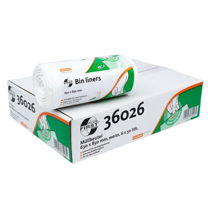 Een rol DEISS First Plus® vuilniszakken van EMIL DEISS KG (GmbH + Co.) ligt op een wit-groene doos met het opschrift '36026'. Op de verpakking staat 'Premium-LDPE' op de voorgrond, daarnaast staat '63 x 85 cm, wit, 6 x 50 stuks'. Bovendien is er een grafiek te zien die de Easy Opener-functie illustreert.